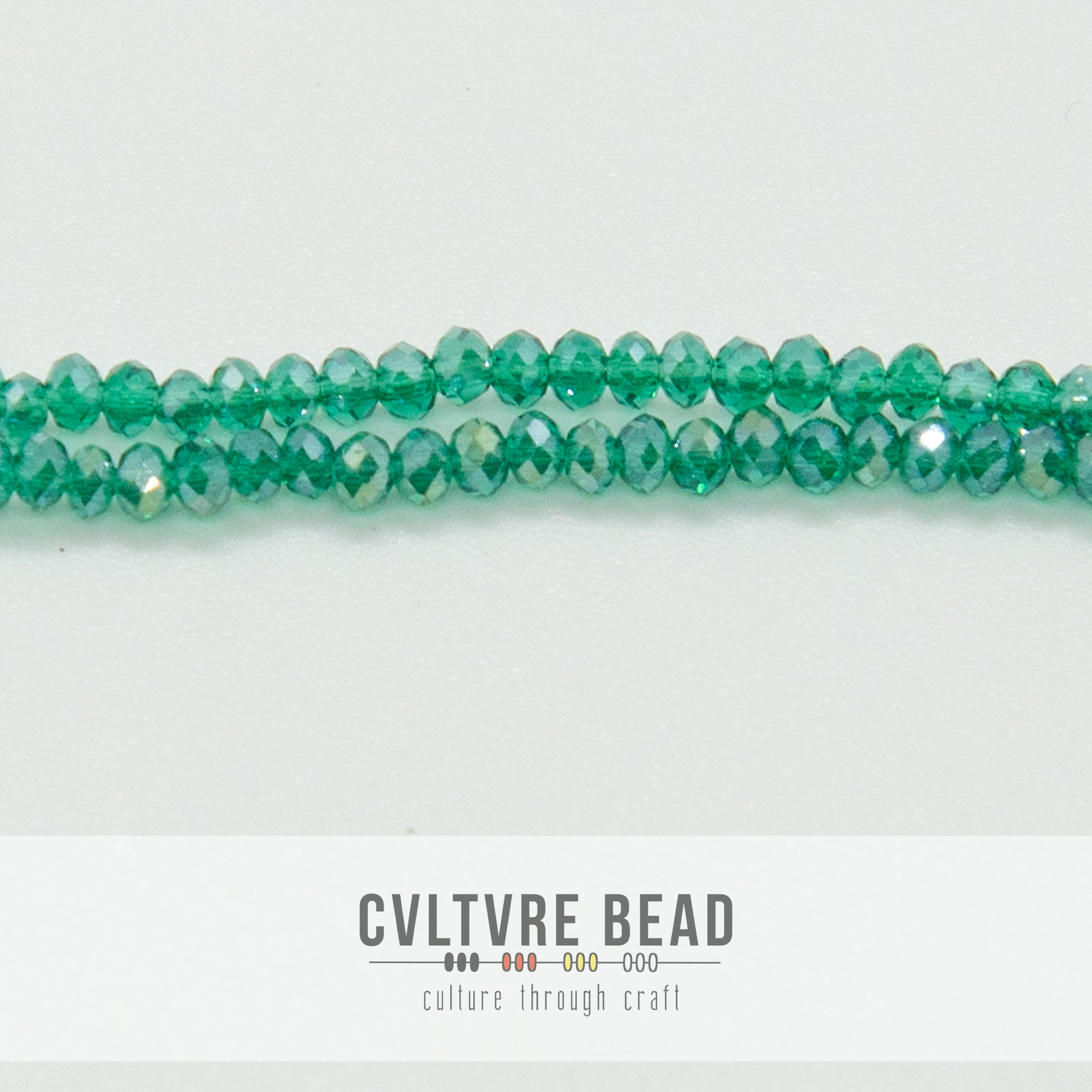 Crystal Lane Rondelle - 1.5x2.5mm -  Trans. Dark Green AB